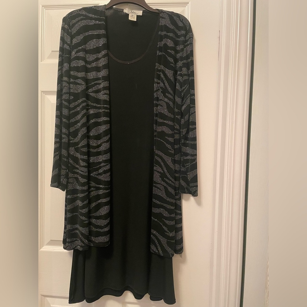 Black knit sleeveless dress with glittery jacket